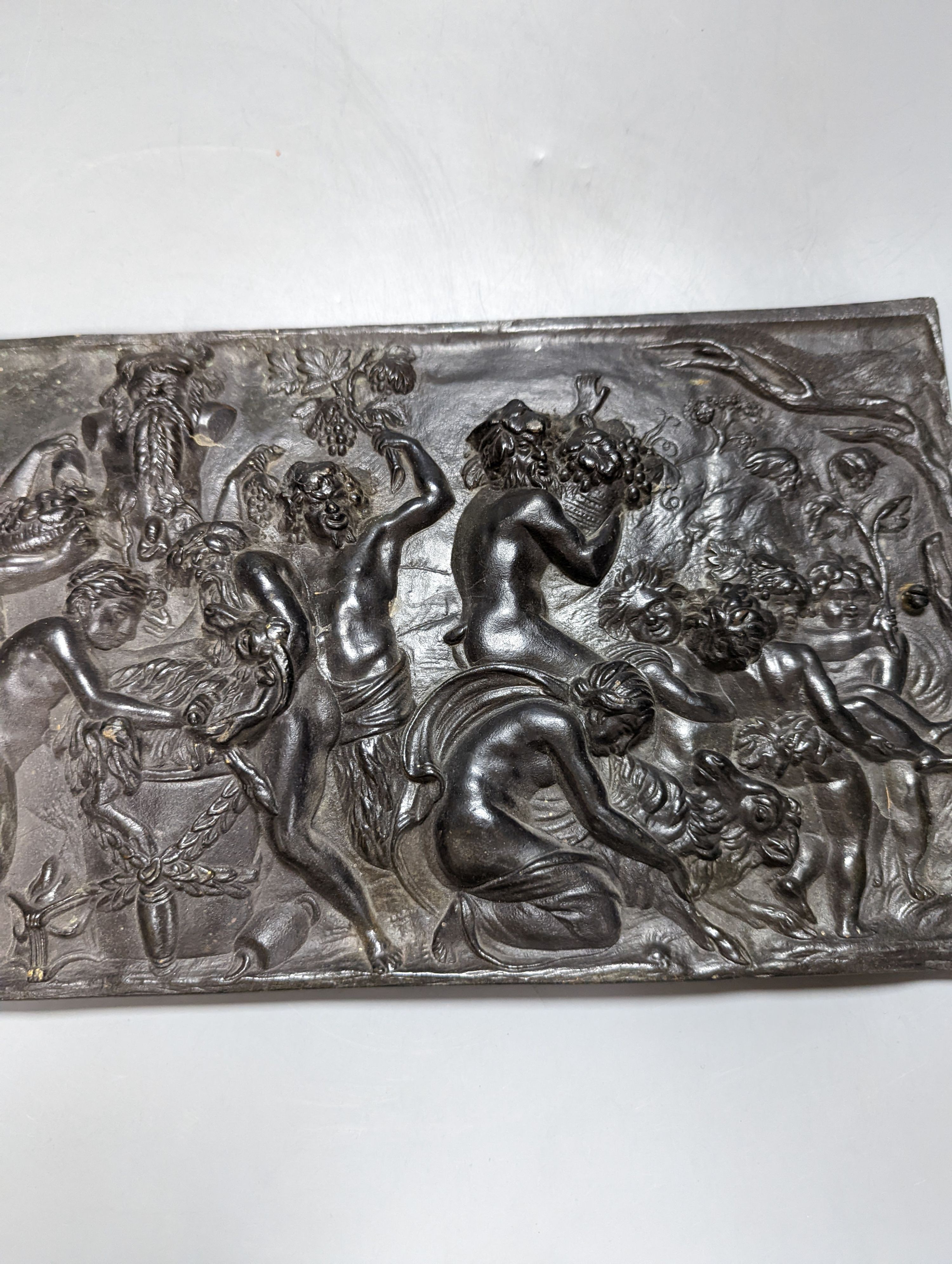 A 19th century cast bronze Bacchanalian plaque, 47 cms wide x20 high.